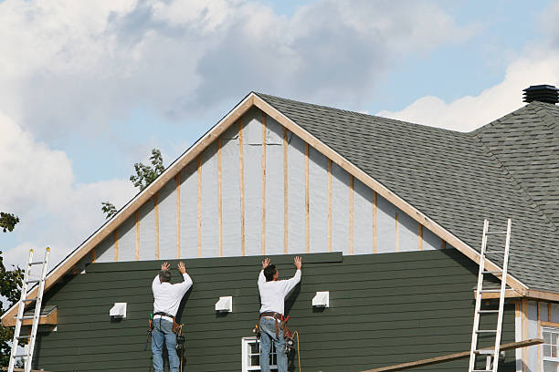 Professional Siding Contractor technician working in Herminie, PA
